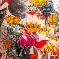 Buy canvas prints of Lamps outside a shop in the souk by Kevin Hellon