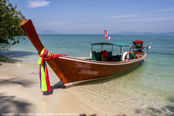 Long tail boat beached on Naka Island, Phuket Picture Board by Kevin Hellon