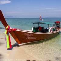 Buy canvas prints of Long tail boat beached on Naka Island, Phuket by Kevin Hellon