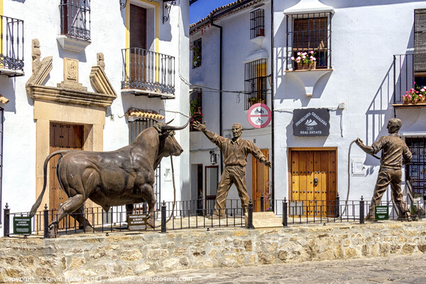 Bullfighting statue, Grazalema, Picture Board by Kevin Hellon