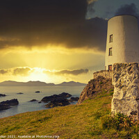 Buy canvas prints of Tyr Mawr lighthouse at sunse by Kevin Hellon