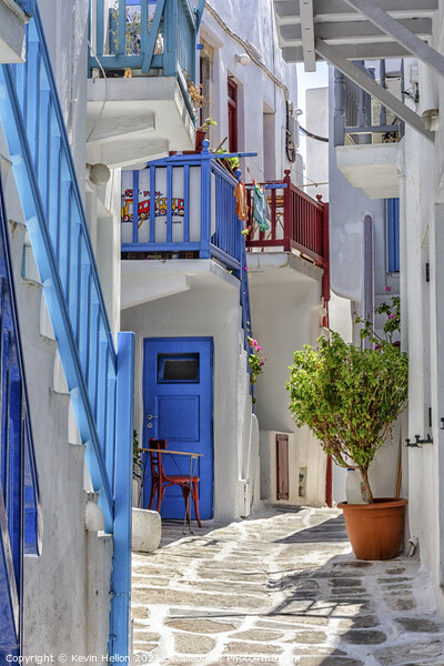 Typical street on the island of Mykonos, Greece Picture Board by Kevin Hellon