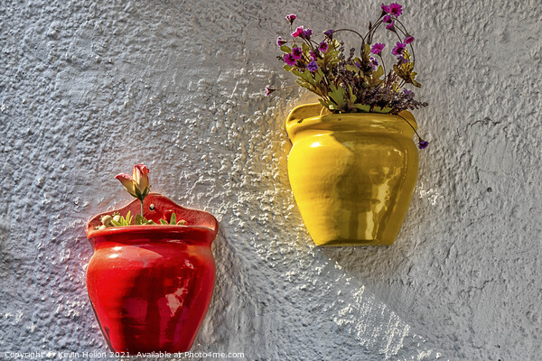 Colourful plantpots with flowers hanging on a wall, Picture Board by Kevin Hellon
