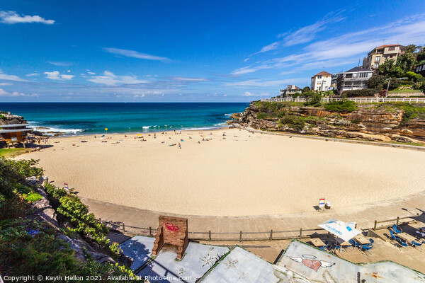 Tamarama beach on a sunny day. Picture Board by Kevin Hellon