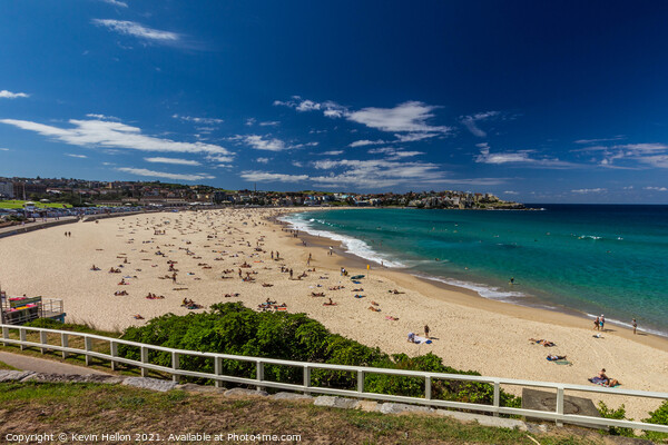Bondi beach on a sunny day. Picture Board by Kevin Hellon