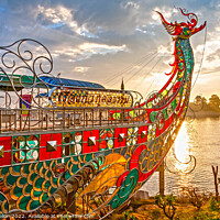 Buy canvas prints of Dragon boat prow at sunset by Kevin Hellon