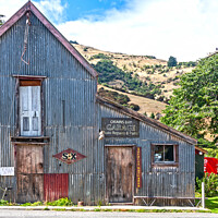 Buy canvas prints of Old Okains Bay garage and auto repair shop by Kevin Hellon