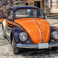 Buy canvas prints of Black and orange vintage Volkswagen Beetle by Kevin Hellon