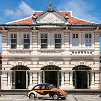 Buy canvas prints of Volkswagen Beetle outiside the the Thai Hua museum.   by Kevin Hellon
