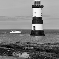 Buy canvas prints of Boat passing by Penmon Lighthouse, by Kevin Hellon