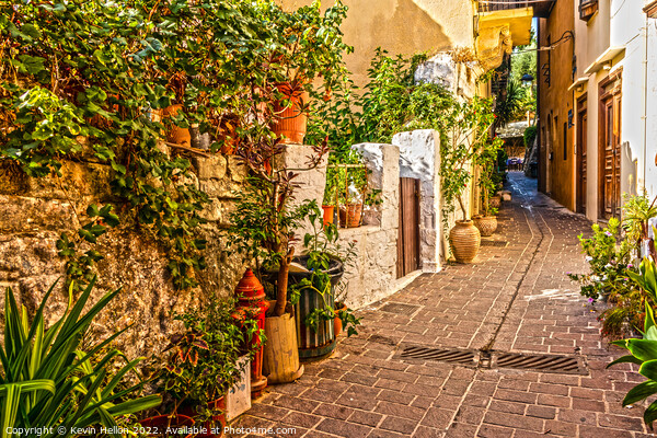 Narrow street in Chania old town Picture Board by Kevin Hellon