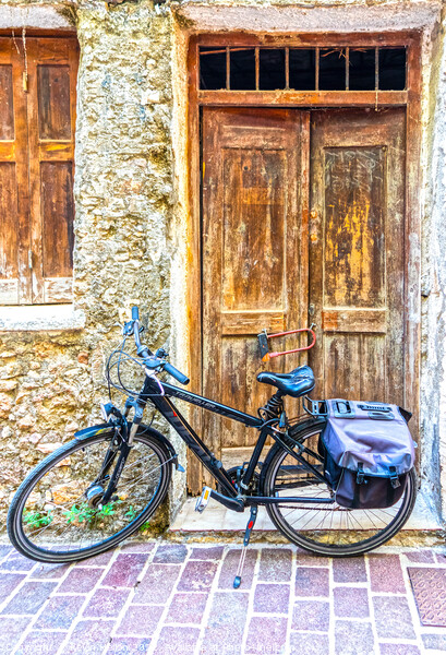 Bicycle and old doors Picture Board by Kevin Hellon