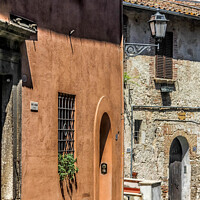 Buy canvas prints of Medieval street in Narni, Umbria, Italy by Kevin Hellon