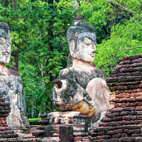 Buy canvas prints of Buddha statues in Khamphaeng Phet Historical Park, Thailand by Kevin Hellon