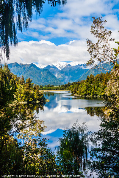 View over Lake Matheson with Mount Cook in the background, South Picture Board by Kevin Hellon