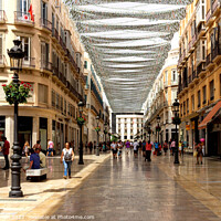 Buy canvas prints of People shopping on Marques de Larios. by Kevin Hellon