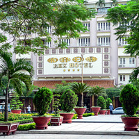 Buy canvas prints of The famous Rex Hotel in Saigon, Vietnam by Kevin Hellon