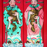 Buy canvas prints of Chinese figures on temple door  by Kevin Hellon