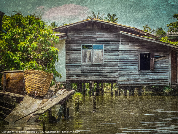 Old teak house on a canal in Thonburi, Bangkok, Thailand Picture Board by Kevin Hellon