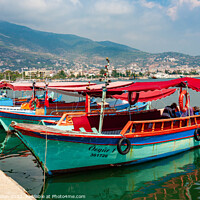 Buy canvas prints of Fishing boats moored in Alanya Harbour, Turkey by Kevin Hellon