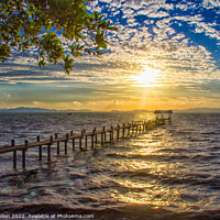 Buy canvas prints of Sunrise over a pier in Phang Nga Bay by Kevin Hellon