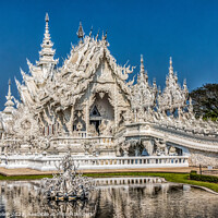 Buy canvas prints of Wat Rong Khun. also known as the White Temple,  by Kevin Hellon