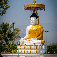 Buy canvas prints of Buddha statue and Thai flag,  by Kevin Hellon