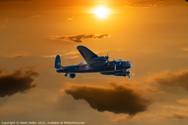 Lncaster bomber in flight at sunset Picture Board by Kevin Hellon