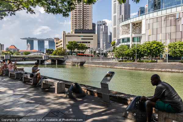 Relaxing by the Singapore River, Clarke Quay, Singapore Picture Board by Kevin Hellon