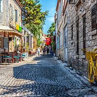 Buy canvas prints of Cobbled street in Alacati, Izmir, Turkey by Kevin Hellon