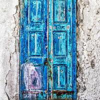 Buy canvas prints of Old blue shutters against a faded plaster wall by Kevin Hellon