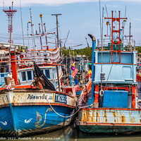 Buy canvas prints of Thai fishing boats in harbour by Kevin Hellon