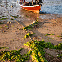 Buy canvas prints of Thai long tail boat moored on sand by Kevin Hellon