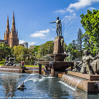 Buy canvas prints of J. F. Archibald Memorial Fountain, Hyde Park with St Marys cathe by Kevin Hellon