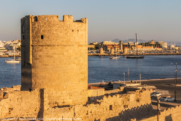 Fortifcations overlooking the harbour in Rhodes Town, Greece Picture Board by Kevin Hellon