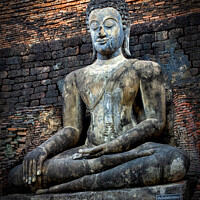 Buy canvas prints of Buddha image,  Sukhothai Historical Park, Thailand by Kevin Hellon