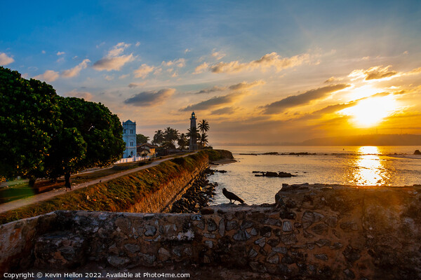 Sunrise at Galle Fort Lighthouse, Sri Lanka Picture Board by Kevin Hellon