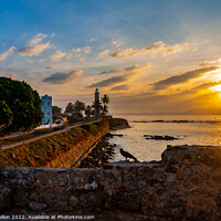 Buy canvas prints of Sunrise at Galle Fort Lighthouse, Sri Lanka by Kevin Hellon