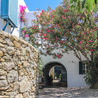 Buy canvas prints of Archway to house, Chora, Mykonos, Greece by Kevin Hellon