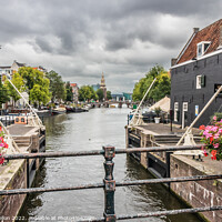 Buy canvas prints of Oudeschans, Amsterdam, Netherlands by Kevin Hellon