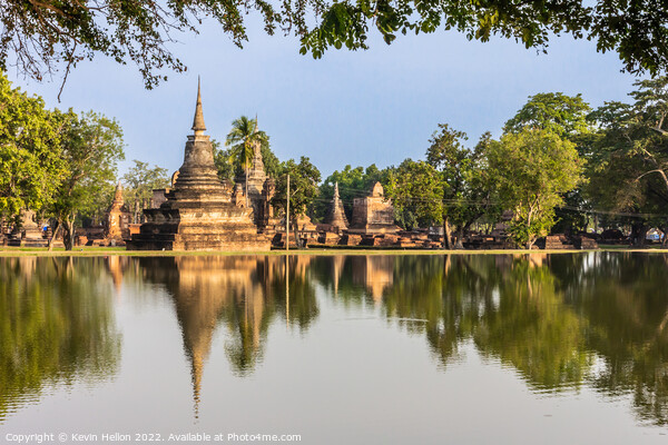 Reflections in the lake of Ayutthaya Historical Park Picture Board by Kevin Hellon