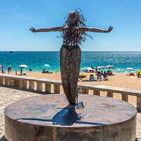 Buy canvas prints of Mermaid statue, Albufeira by Kevin Hellon