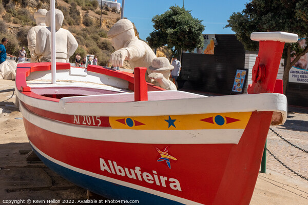 Boat and stone statues, Albufeira old town, Picture Board by Kevin Hellon