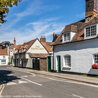 Buy canvas prints of The Rising Sun pub and cottages, by Kevin Hellon