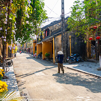 Buy canvas prints of Typical street, Hoi An, Vietnam by Kevin Hellon