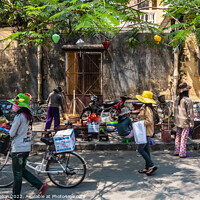 Buy canvas prints of Typical street scene, Hoi An, by Kevin Hellon