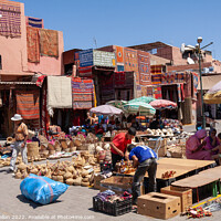Buy canvas prints of Market place in Marrakech, Morocco by Kevin Hellon
