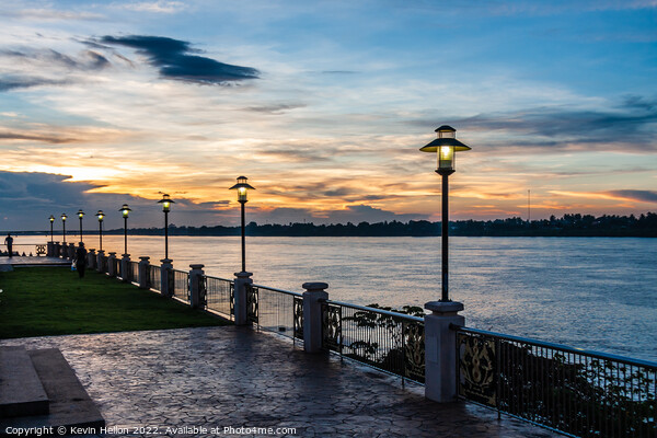 Sunset on the Mekhong river on the promenade in Nong Khai, Thail Picture Board by Kevin Hellon