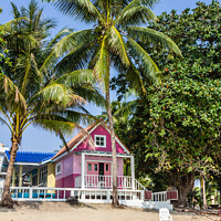 Buy canvas prints of Pink Bungalow on the beach by Kevin Hellon