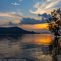 Buy canvas prints of Sunrise in Phang Nga Bay, by Kevin Hellon